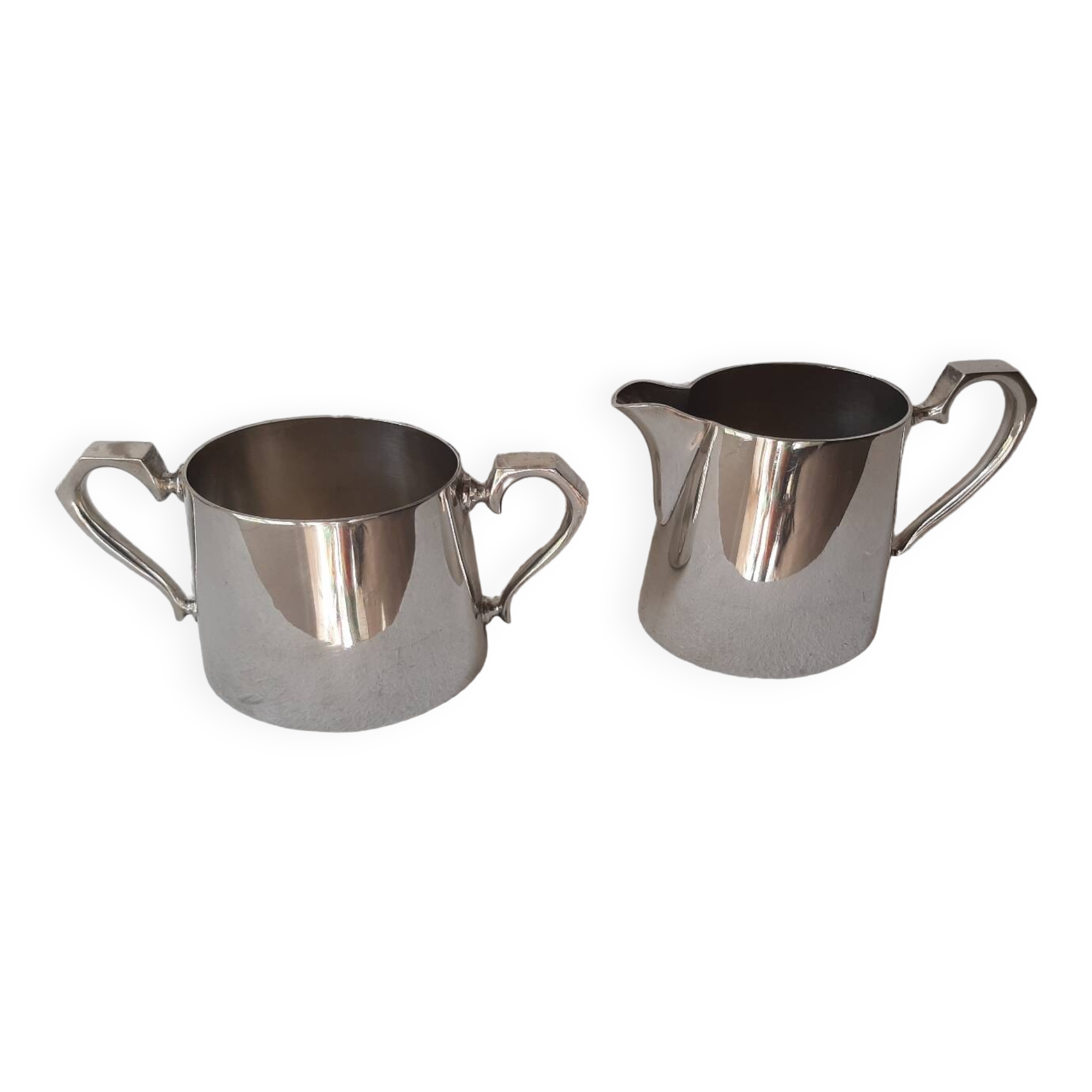 Milk jug and sugar bowl