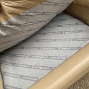 2/3-seater sofa in genuine beige leather by Roche Bobois. Very good condition, great comfort.