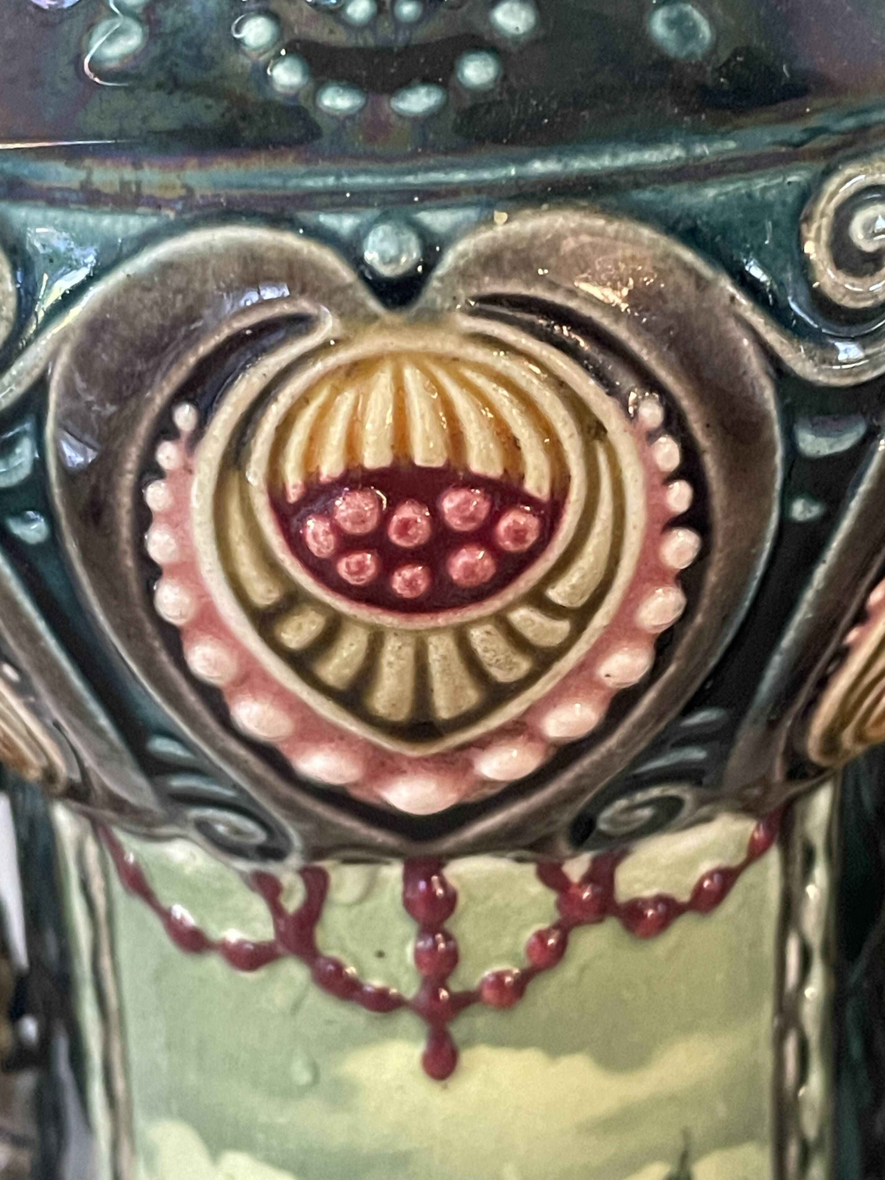 Pair of Art Nouveau slipware vases, hand-painted decoration.