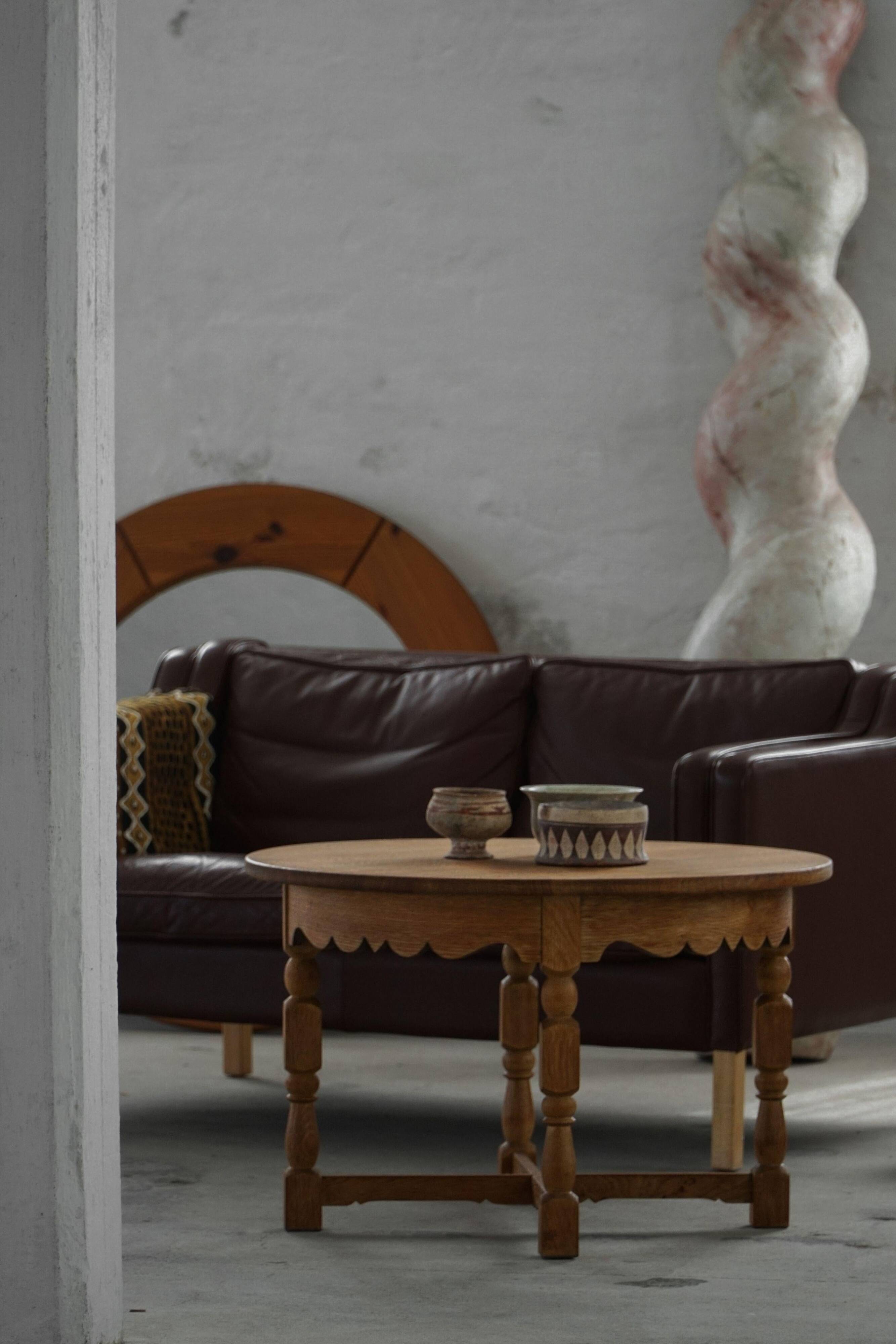 Mid-century Danish round side table in solid oak, Henning Kjærnulf, 1960s.
