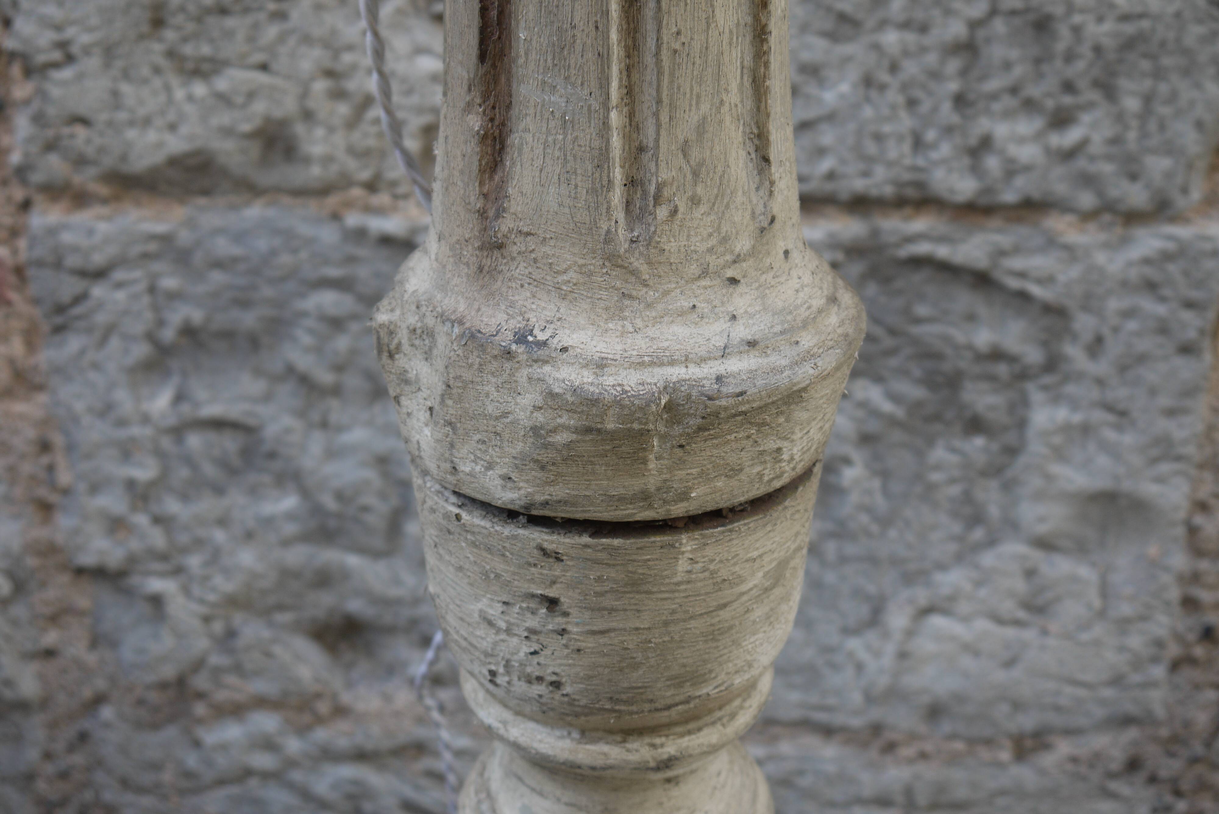 Baluster lamp foot in patinated wood