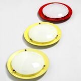 Three round 1950s wall or ceiling lamps made of metal and plexiglass shades