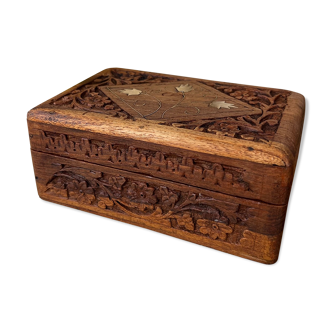 Carved wooden box with brass inlay
