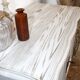 Meuble ancien en bois blanc et doré