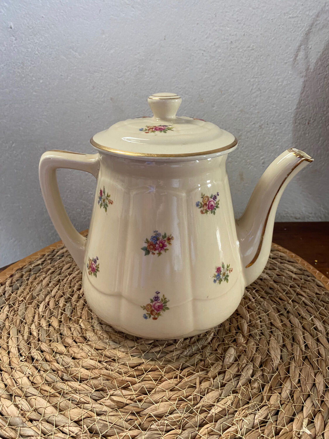 Old teapot or coffee maker in English style.