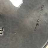 Underside of flat ceramic pink flowers La Roue de Vallauris