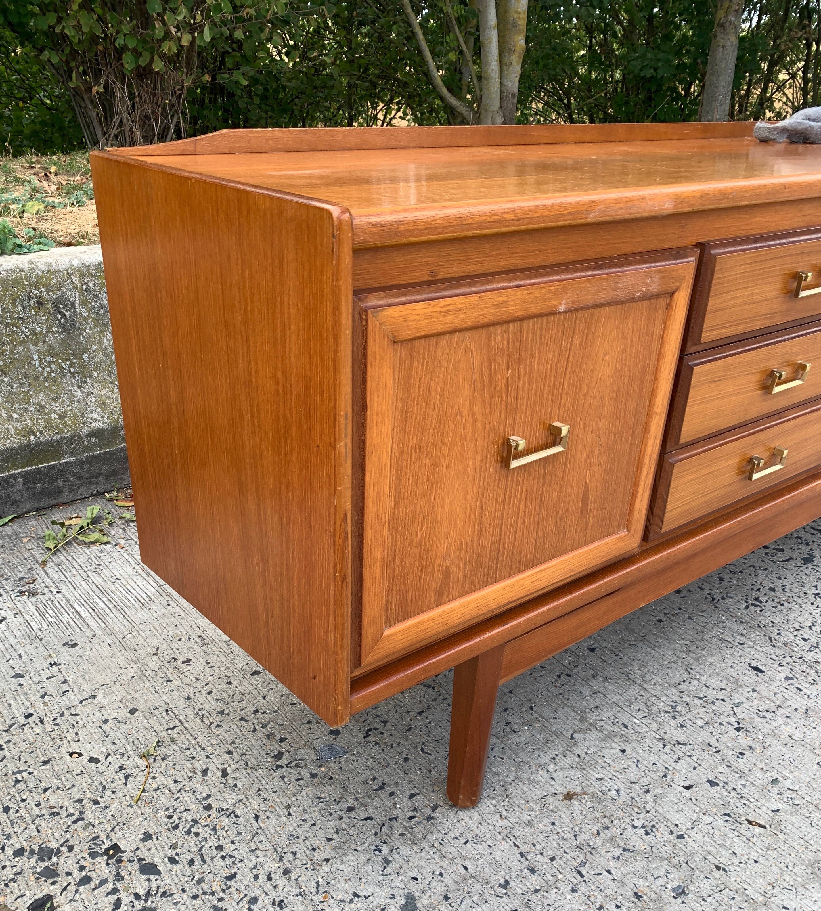 Teak enfilade from the 1970s by the English brand William Laurence.