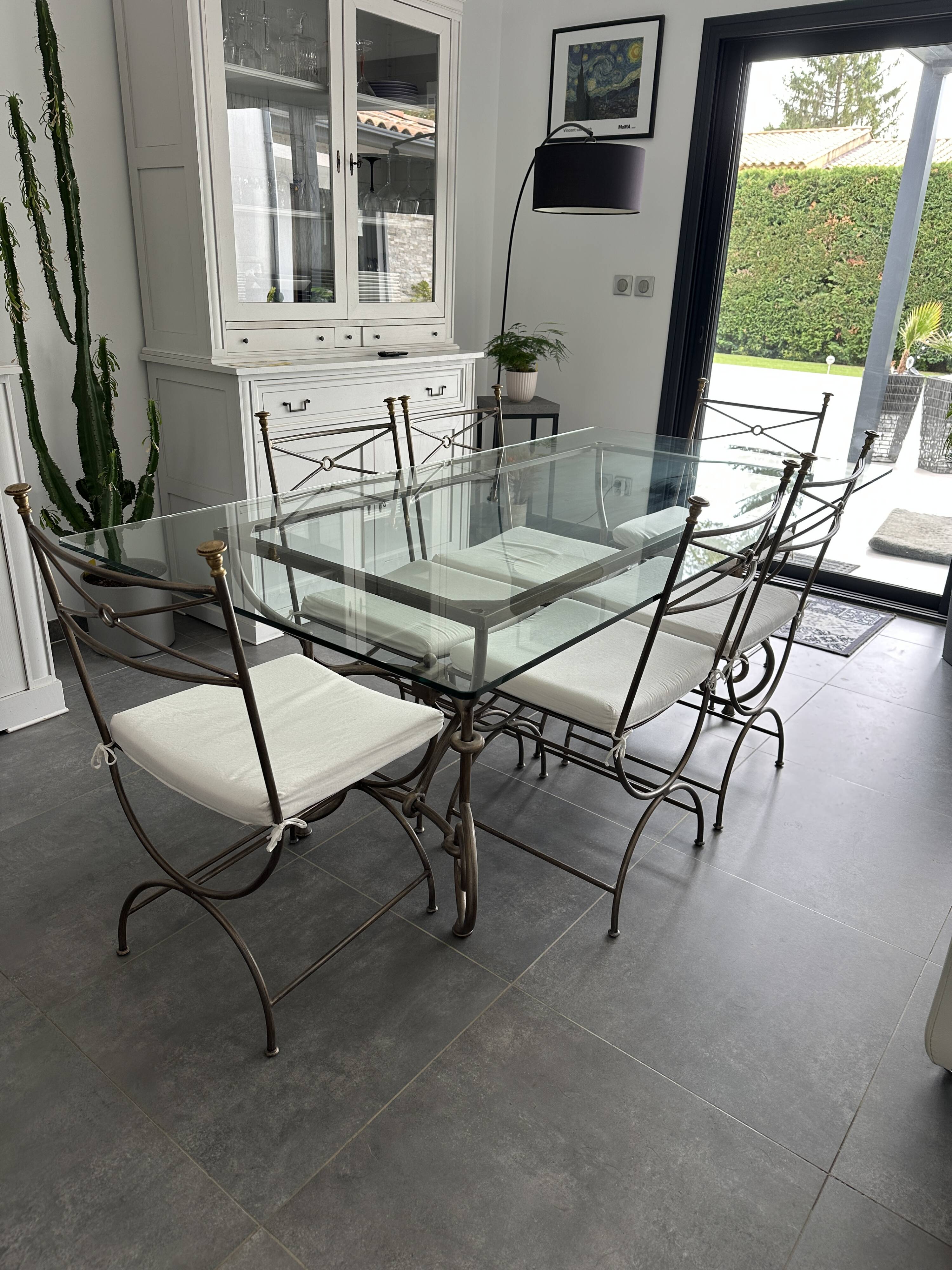Roche Bobois glass and steel dining table and 6 chairs