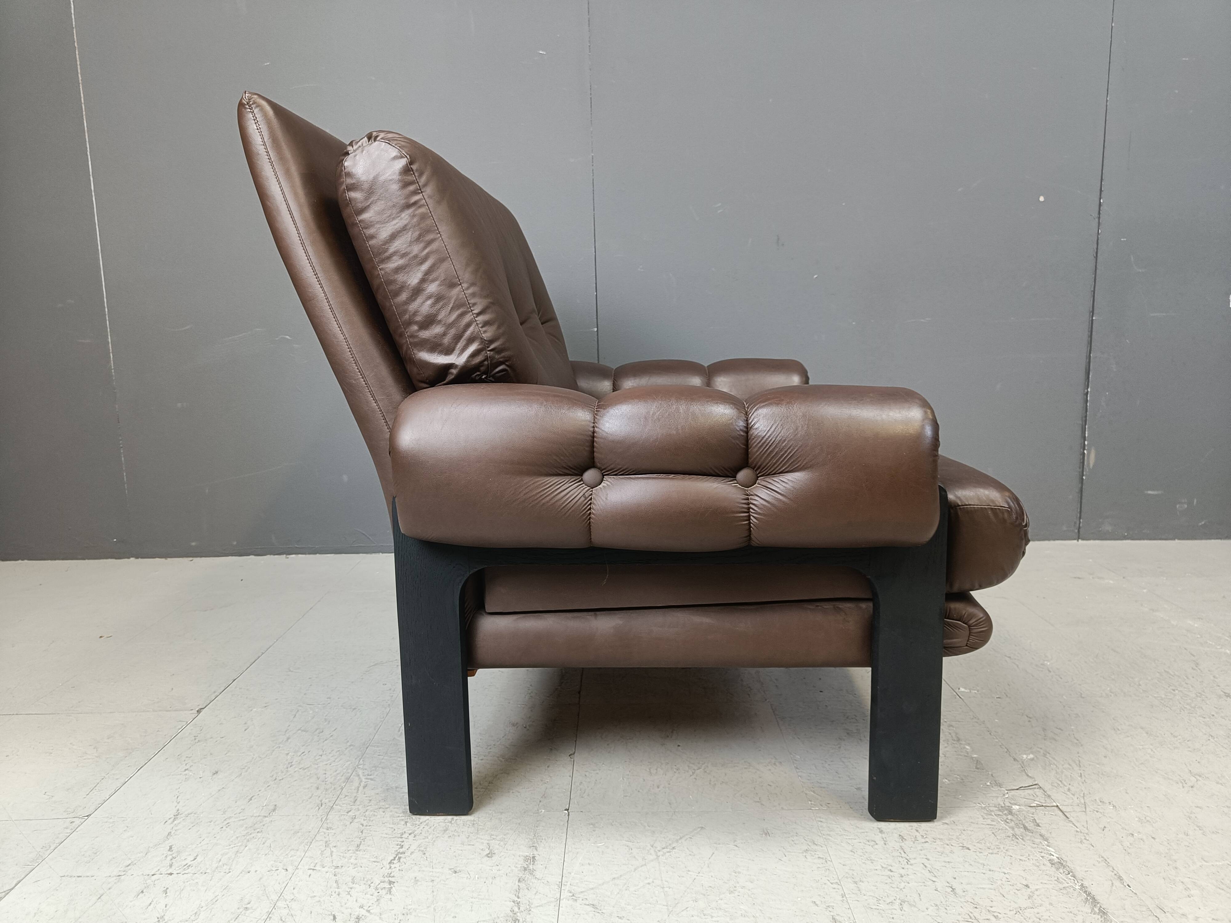 Pair of leather armchairs made in Denmark, 1960s