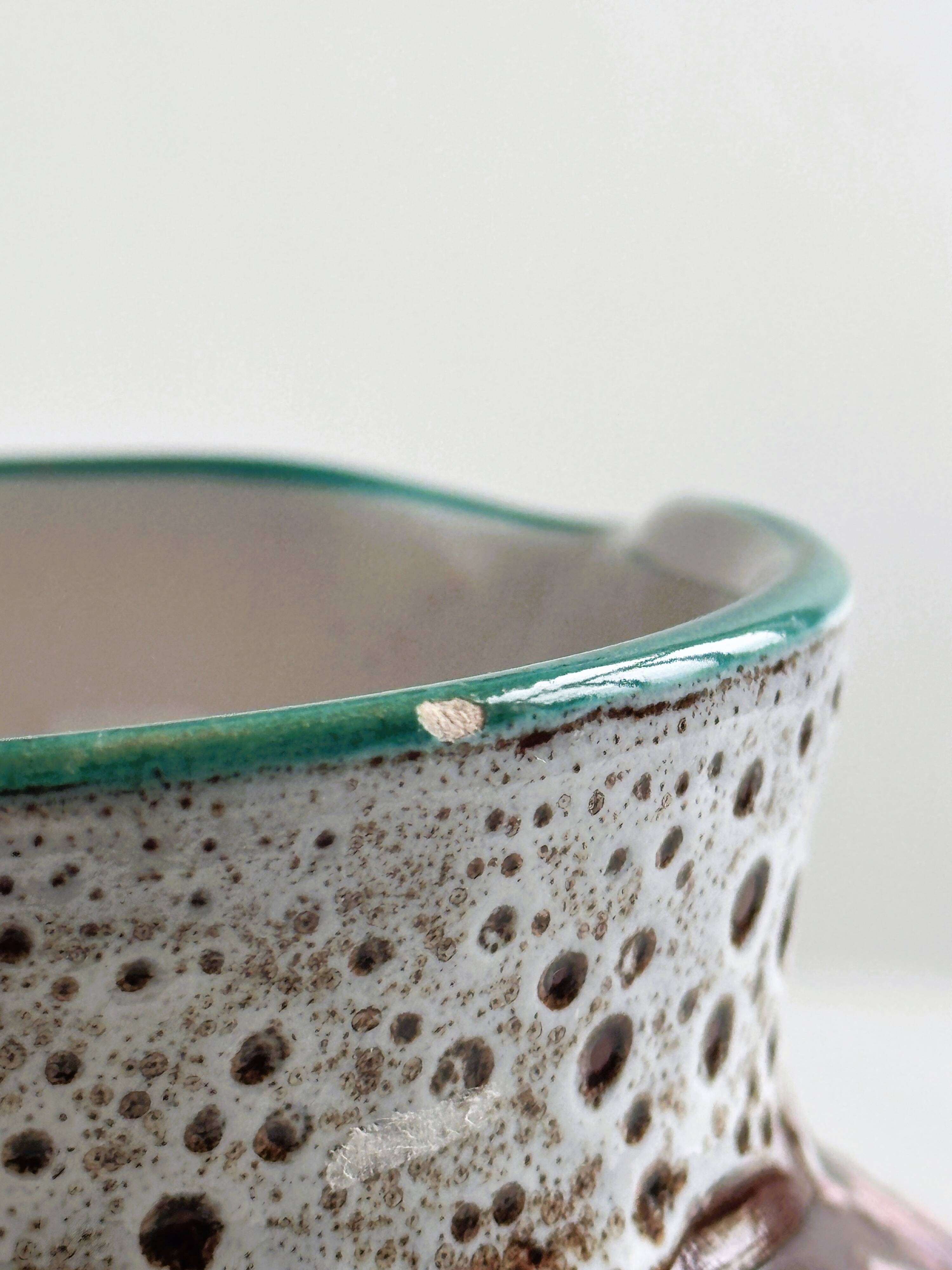 Antique decorative pitcher in French ceramic