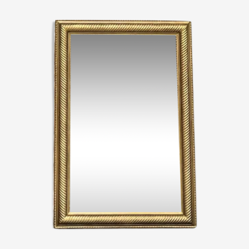 Miroir Miroir époque 19ème doré à la feuille d’or 116cm/79,5cm  parqueté au dos, trumeau