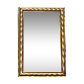 Miroir Miroir époque 19ème doré à la feuille d’or 116cm/79,5cm  parqueté au dos, trumeau