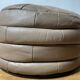 Pair of De Sède patchwork leather poufs