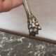 Antique silver metal sugar clamp