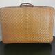 Vintage wicker suitcase