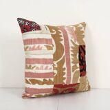 Vintage neutral suzani patchwork pillow fashioned from a mid-20th century samarkand suzani