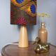 Table lamp in blond wood with handmade wax shade