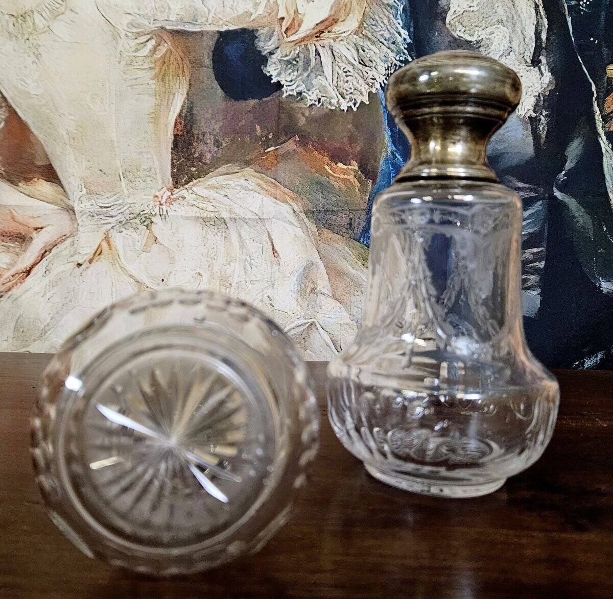 Pair of antique Louis XVI style bottles in finely engraved crystal and silver.