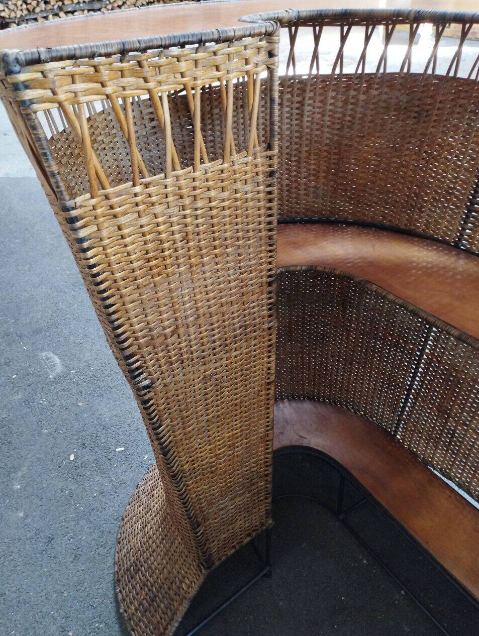 Vintage rattan and metal bar and its stools.