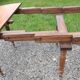 Large six-foot table with XIX century folding leaves in solid walnut Ø120 extendable to 330.