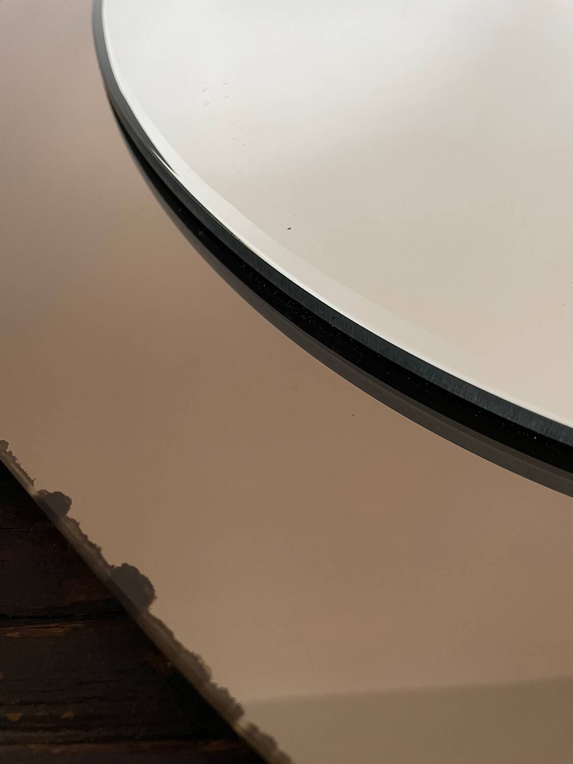 Miroir en verre fumé bicolore, vers 1970