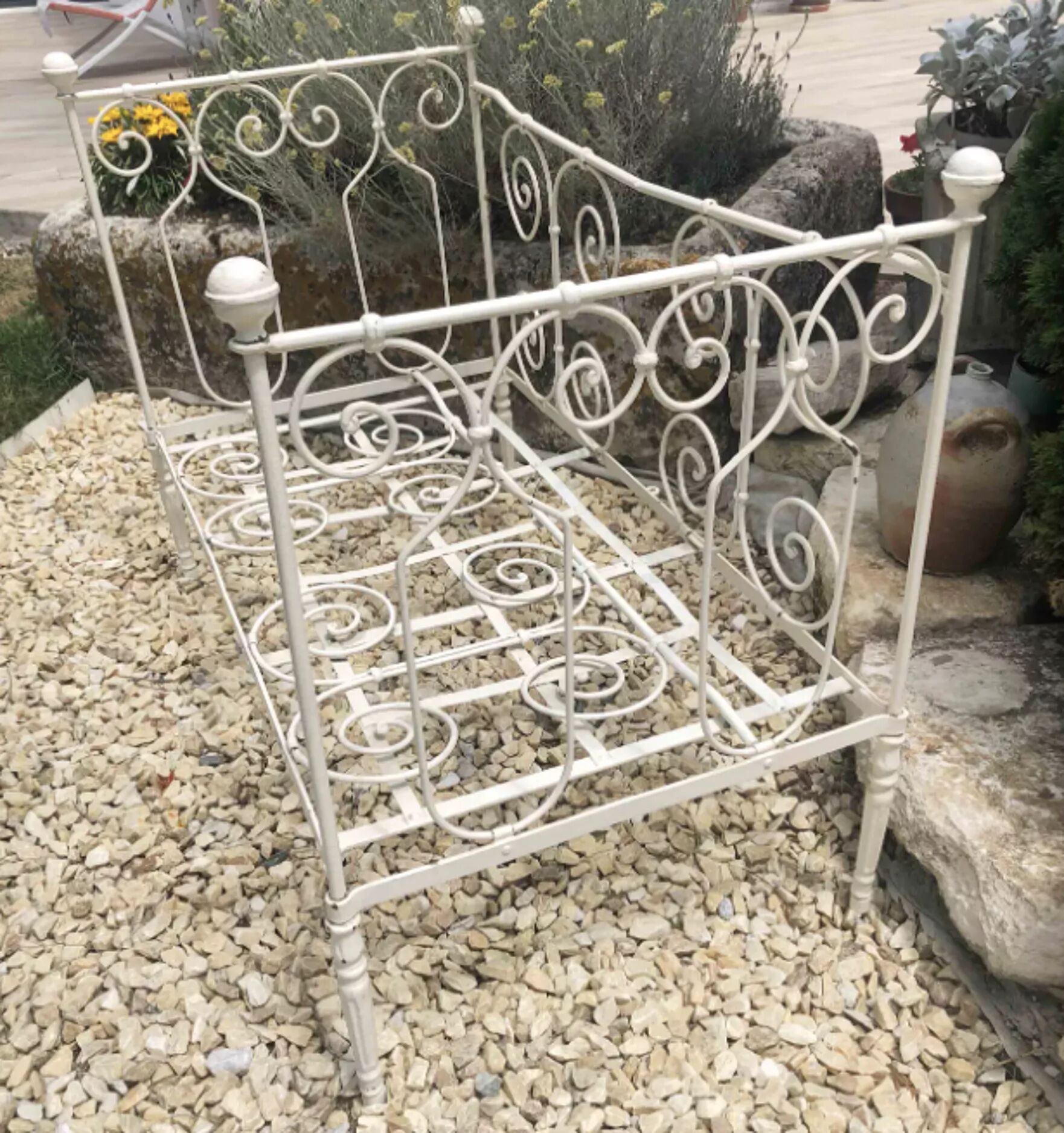 White wrought iron bed