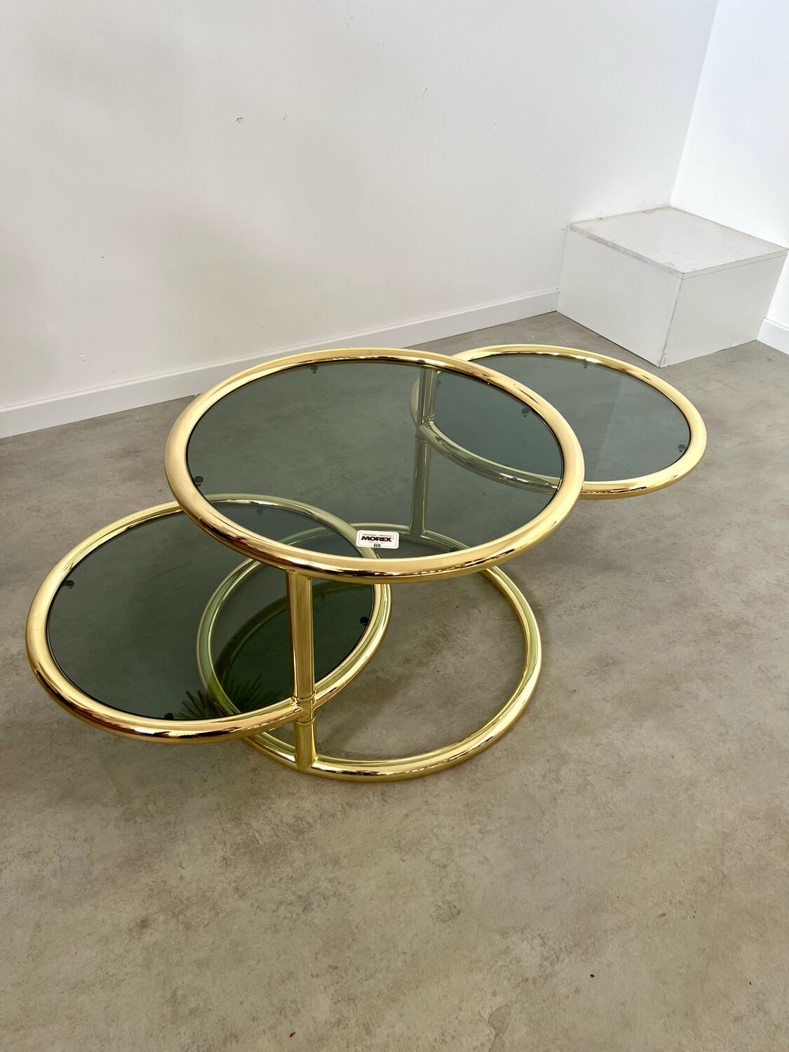 Three-level swivel coffee table in morex design brass Milo Baughman italy