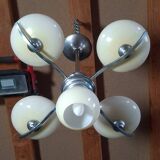 Chrome metal chandelier with 5 pale yellow opal shades from the 1950s.