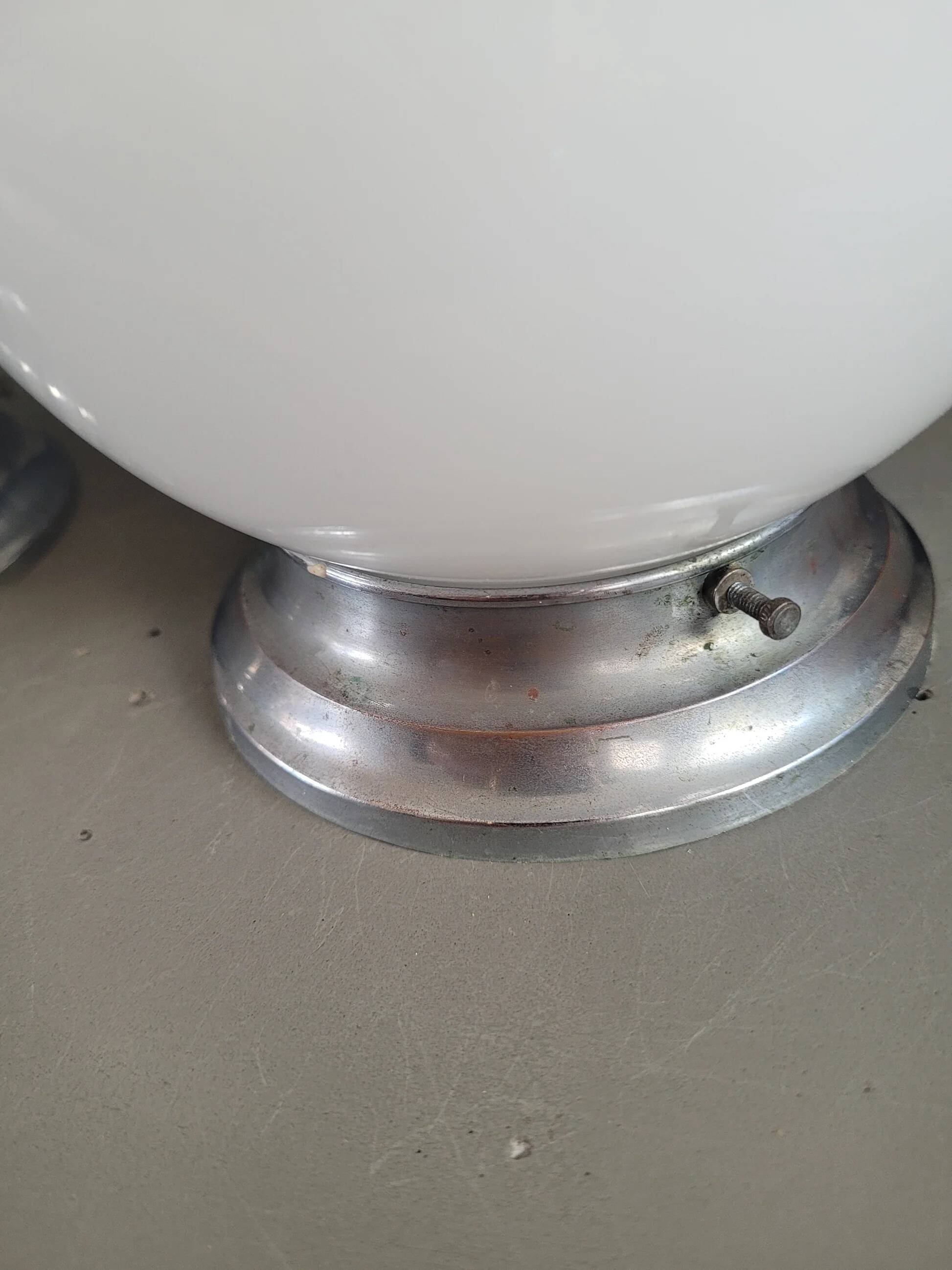 Pair of ceiling lights or wall lights with white glass globes.