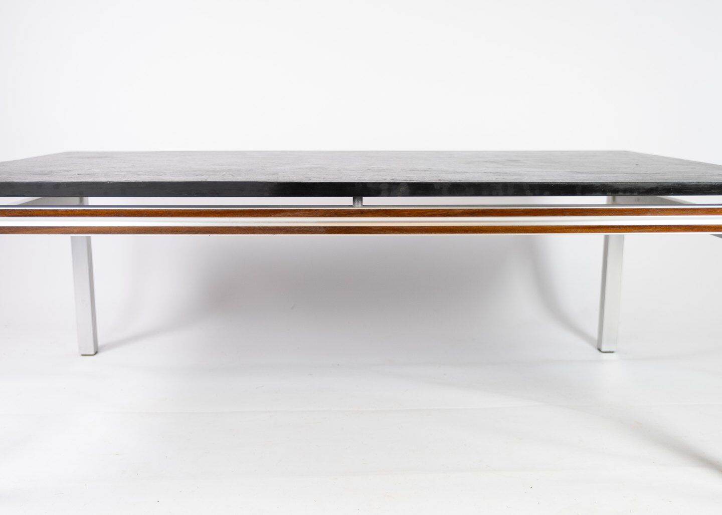 Coffee table with black slate plate and frame in rosewood and metal, of danish design from the 1970s