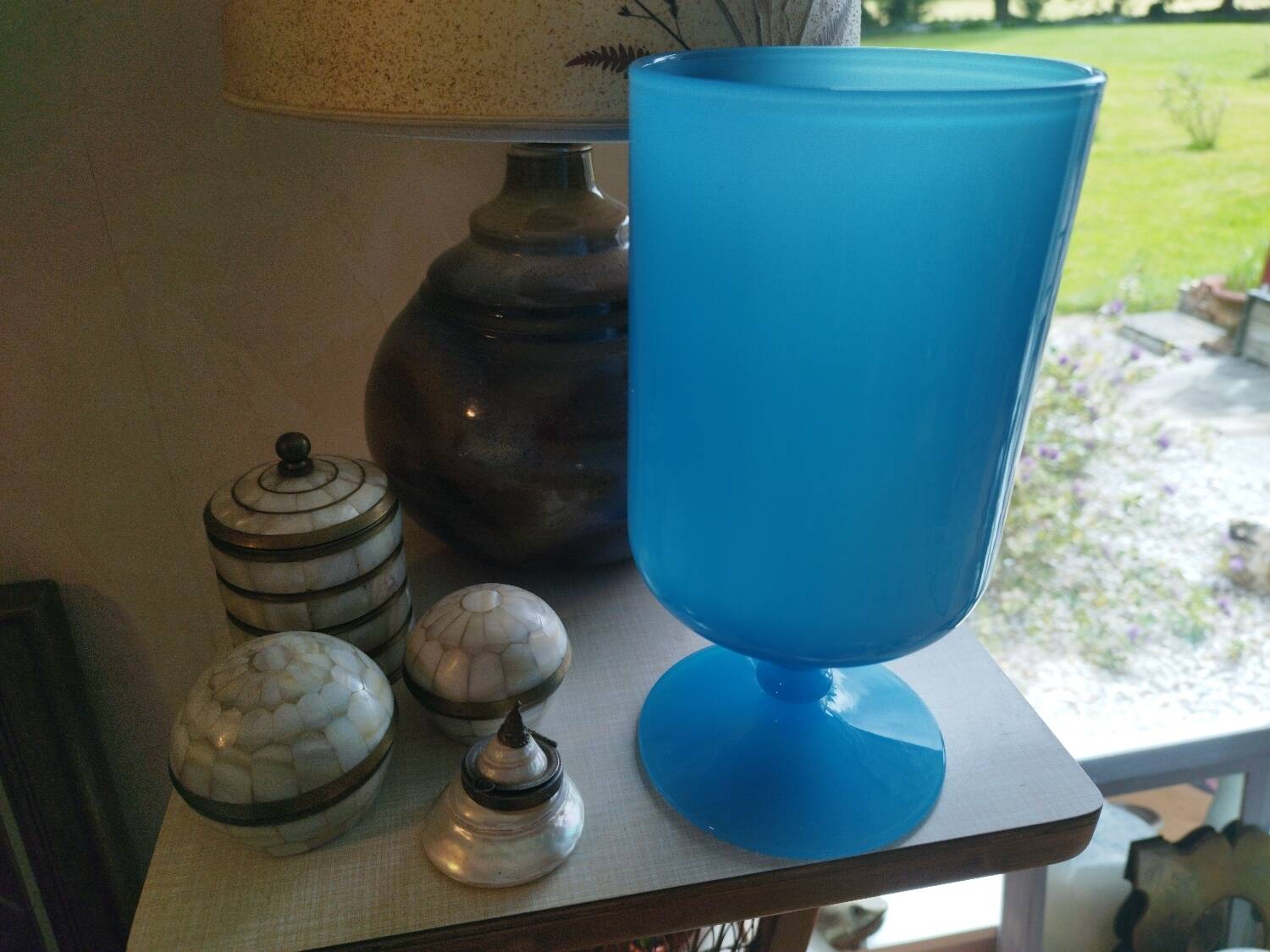 Blue vase on opaline pedestal