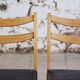 Pair of Scandinavian chairs in teak and faux leather, 1960.