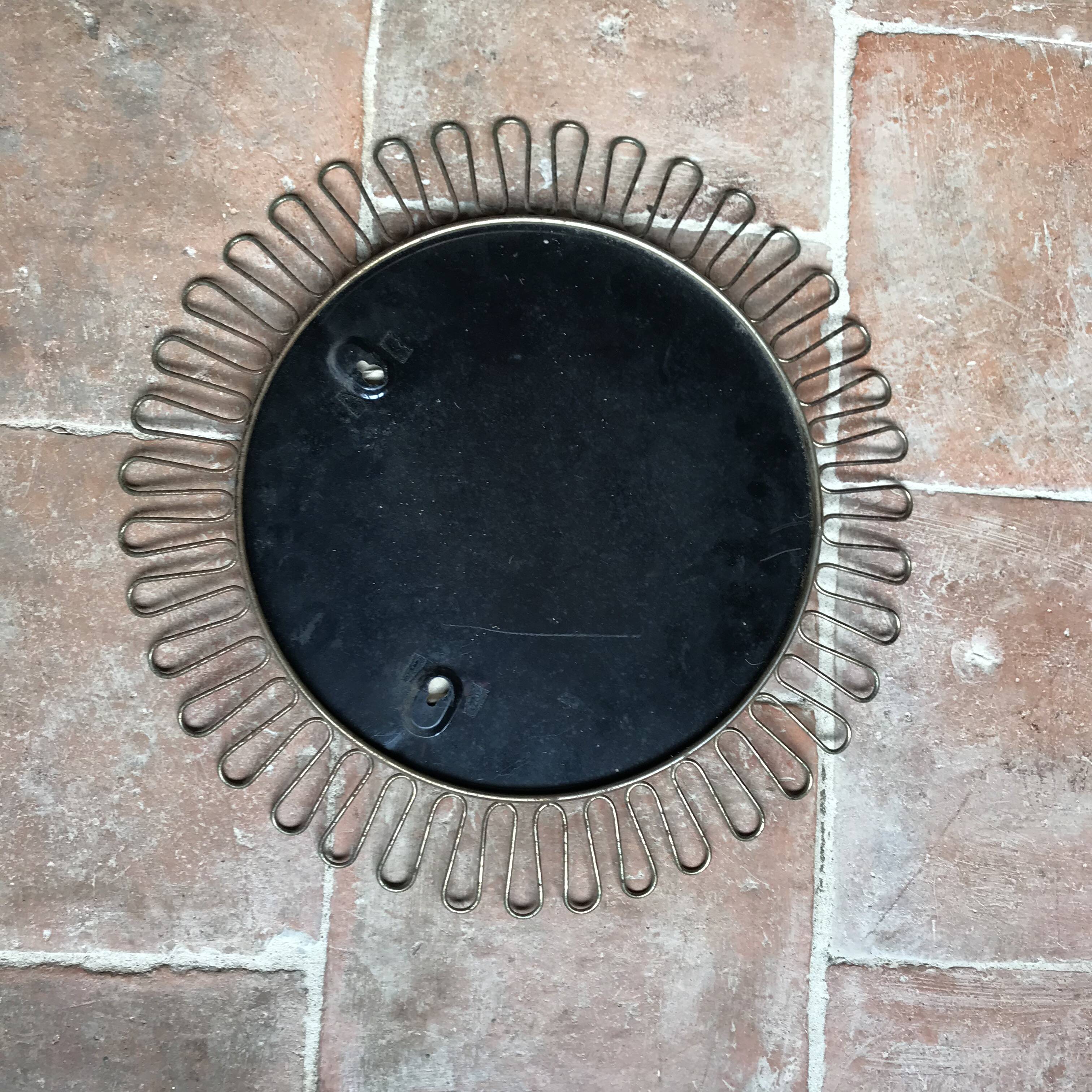 Vintage round sun-shaped mirror in the style of Josef Frank.