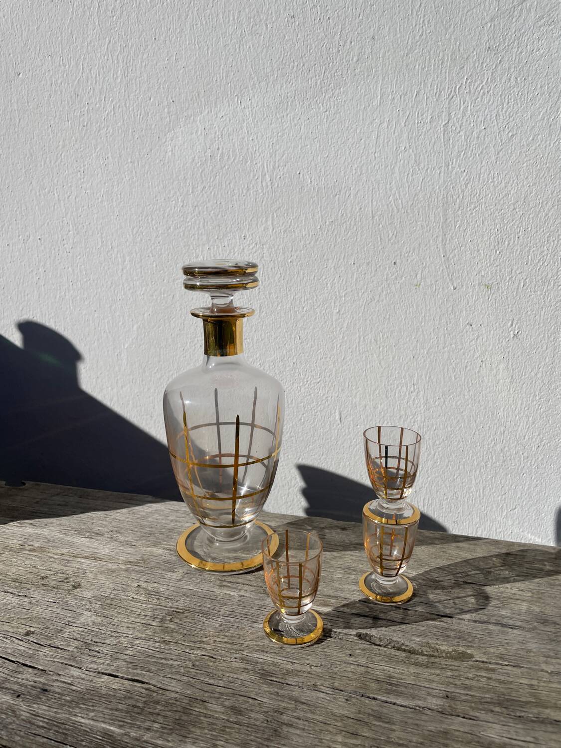 Art Deco glass and gold carafe or vase from the 1950s.