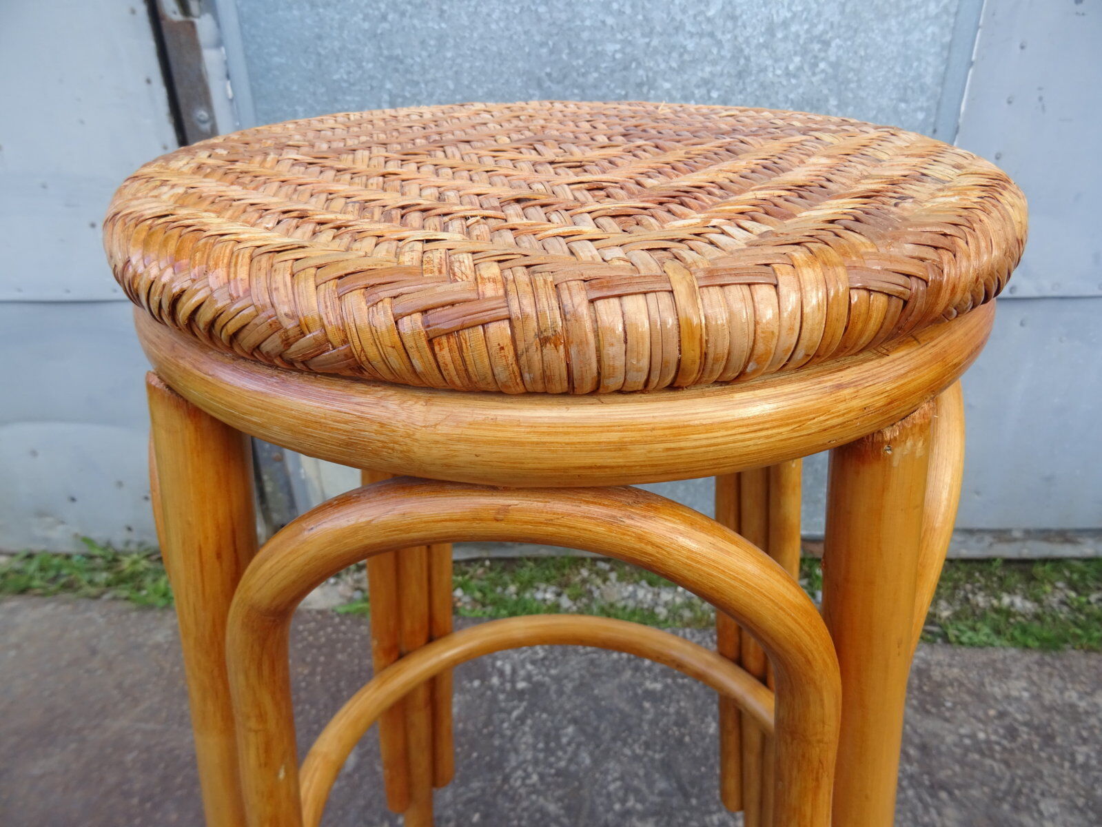 High bar stool in woven rattan