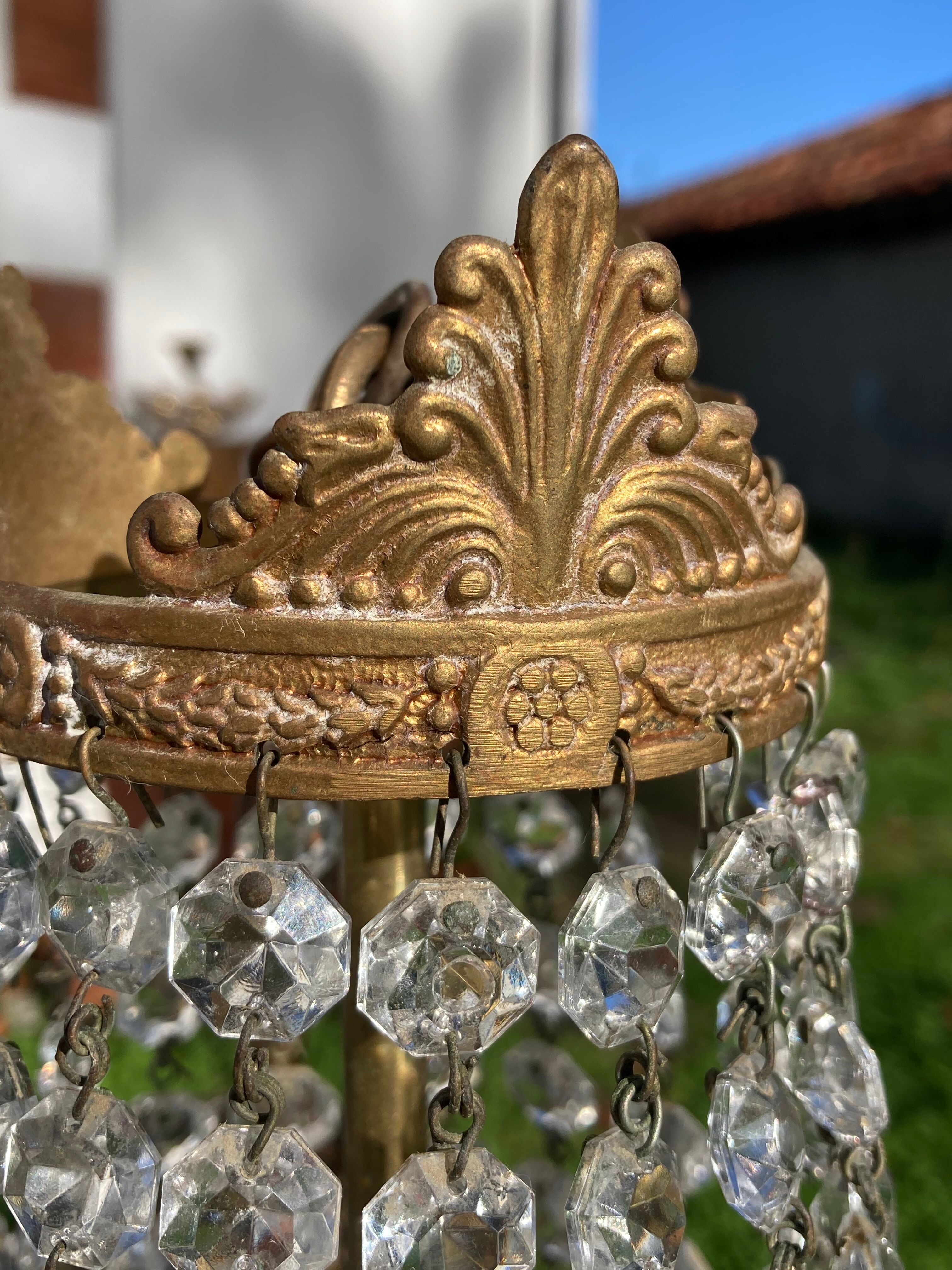 Balloon chandelier with glass crystal and brass tassels in empire style