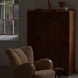 Pair of Danish Art Deco modern lounge chairs in sheepskin with lambswool and elm, 1940s.