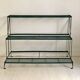Green metal plant holder