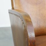 Cognac-colored sheepskin and wooden Art Deco design armchair