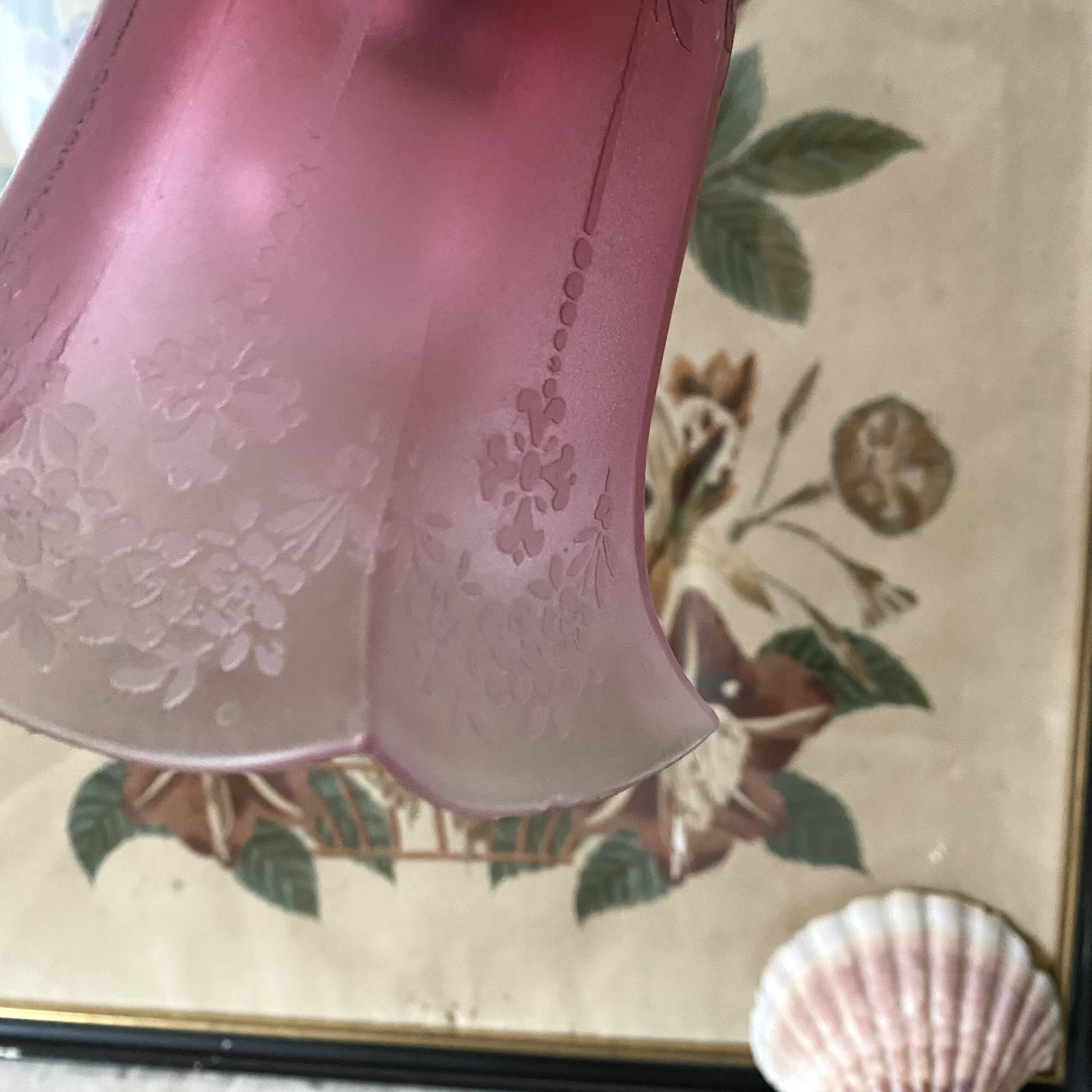 Antique jeweller's lamp, silver-plated base, frosted pink glass shade.