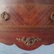 Half-moon commode in Louis XV style with walnut veneer.