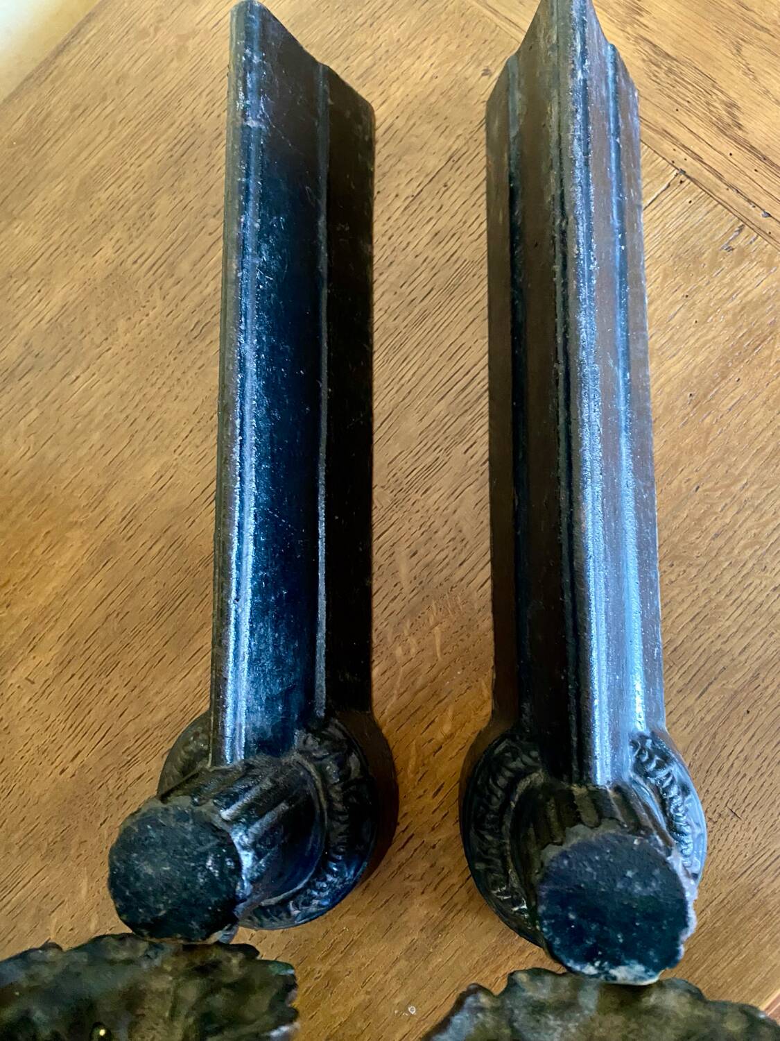 Pair of antique fire dogs with lion heads - patinated cast iron