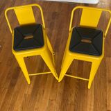 Pair of yellow Tolix high chairs