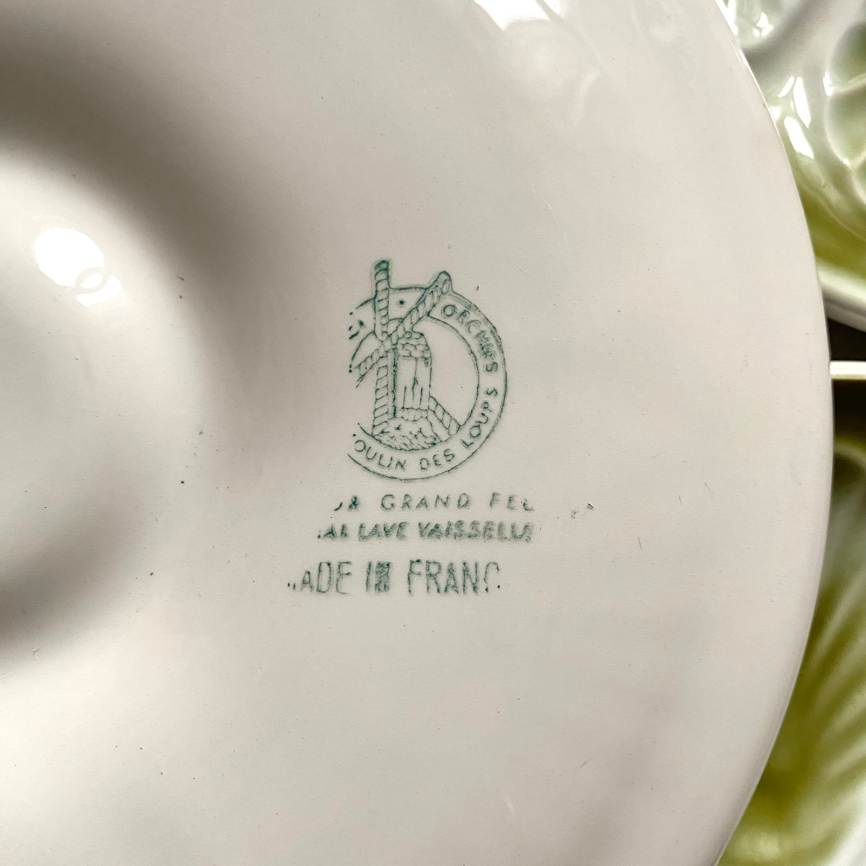 Set of 10 Moulin de Loups oyster plates
