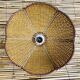 Bohemian suspension in braided raffia and brown fabric