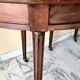 Extendable half-moon table in Louis XVI style