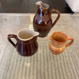 Trio of vintage jugs and milk jug