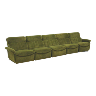 Green velvet vintage element sofa made in the 1970s