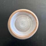 White vase with plant decoration