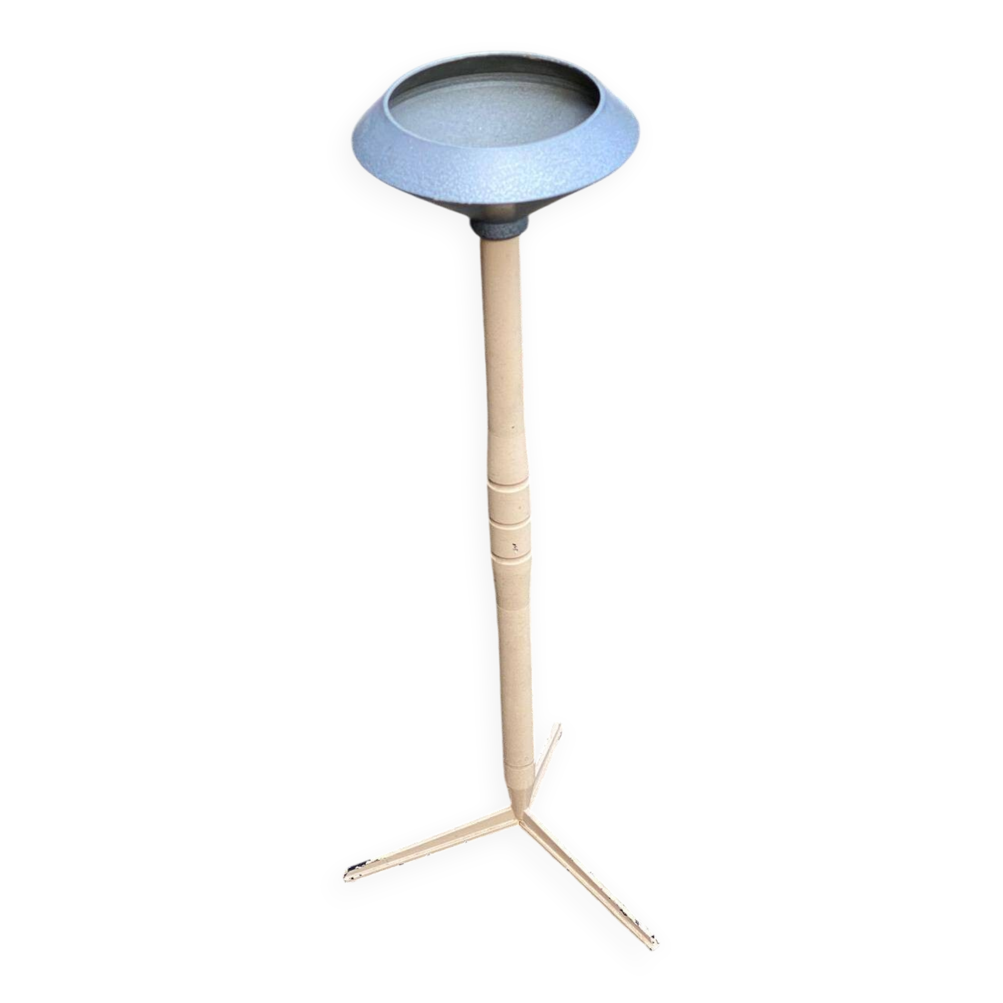 Vintage ashtray on a beige and grey metal stand.